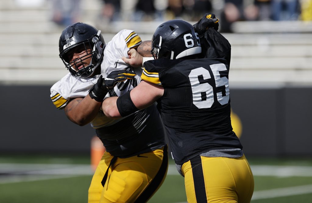 Iowa football notebook: Linderbaum, Moss undecided on whether to declare  for NFL Draft