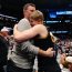 koch father son embrace